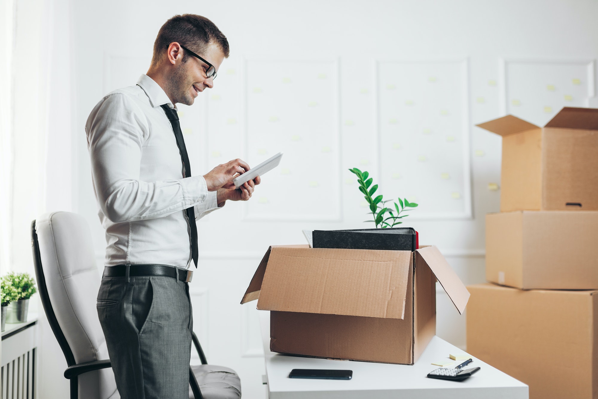 Businessman moving into a new office